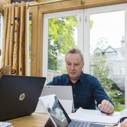 Cambridge historian and his family members announced as joint winners of one of the biggest cash prizes in world economics