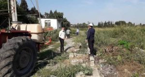 سمپاشی محوطه فضای مزارع و باغ های ایستگاه تحقیقاتی چالکی مرکز تحقیقات و آموزش گلستان