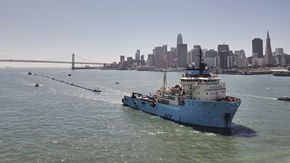 Still controversial, plastic trash collector for ocean begins maiden voyage