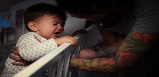 You should soothe babies who wake at night – it speeds sleep training