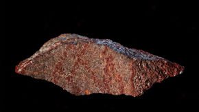 These red crayon markings may be the first known human drawing