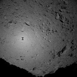 Japan’s asteroid mission drops first rovers onto ‘dumpling’ space rock