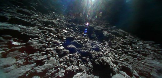 Japanese space hoppers capture the sun moving across an asteroid sky